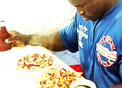Ronnie Coleman - Large plate of Chicken strips, Large Plate of Fries & a Cold Drink!!